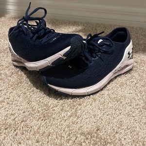 Under Armour sneakers size 8 navy blue. Bluetooth connect to track running.